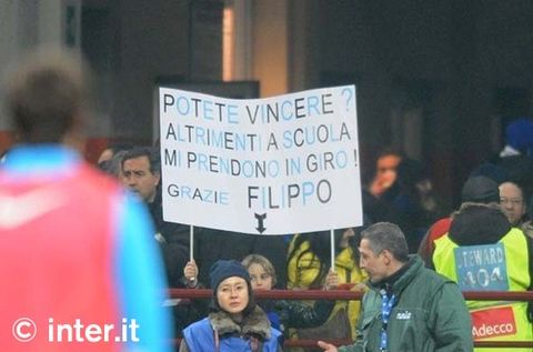 MILAN - The banner held up by Filippo in San Siro during  Inter v Bologna: "Can you win? Otherwise I'll get teased at school. Thanks. Filippo"