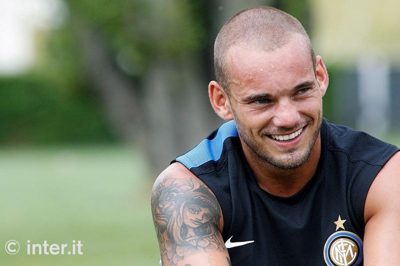 APPIANO GENTILE - A grinning Sneijder, ready for a fresh start with Inter