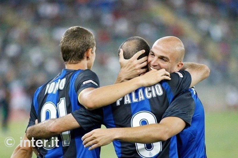 BARI - He is embraced by Cambiasso and Longo