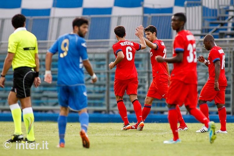 COMO – “High five” with teammate Matias Silvestre following his goal