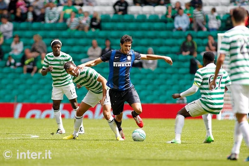 GLASGOW - Ranocchia gets past a challenge from Ledley