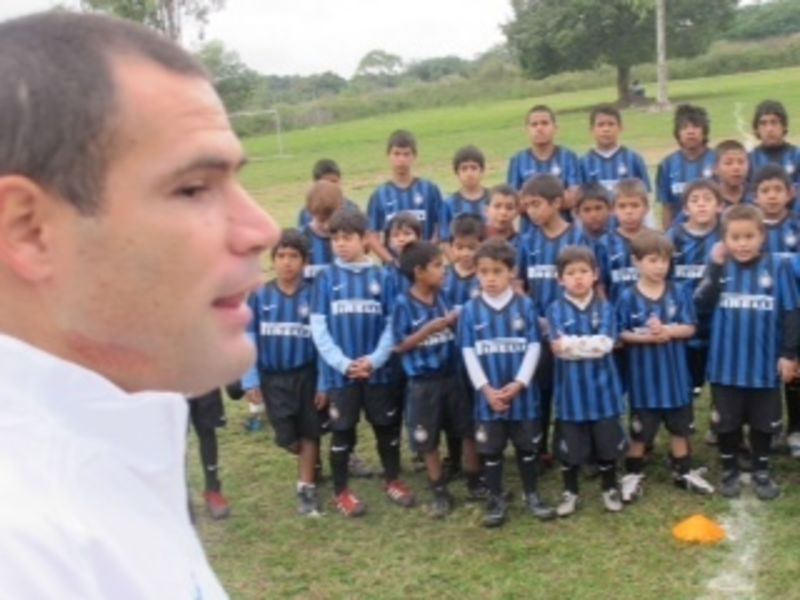ZEBALLOS CUE - Julio Gonzales runs through the day's programme with the children