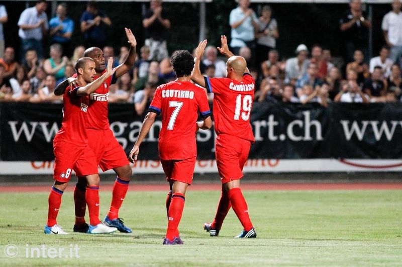 LOCARNO - Cambiasso celebrates with team-mates after scoring the opener